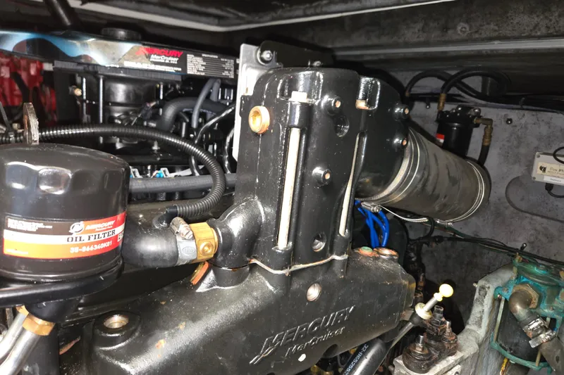 Slide: The Image of Engine compartment of a 1998 Sea Ray 340 Amberjack with Mercury components. - 54