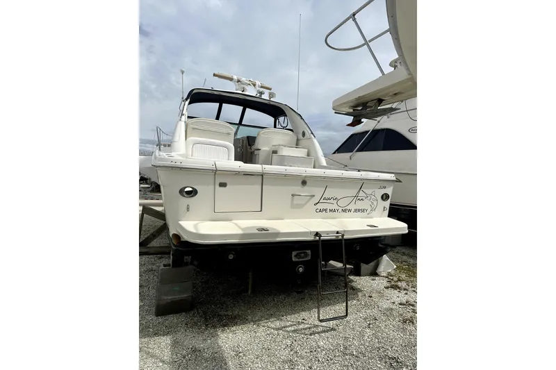 Slide: The Image of 1998 Sea Ray 340 Amberjack boat docked, rear view, Cape May, New Jersey. - 6