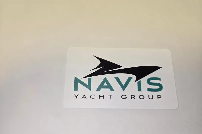 Slide: The Image of Navis Yacht Group logo on Sea Ray 340 Amberjack, 1998 model. - 60