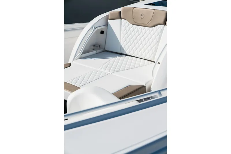 Slide: The Image of Luxurious seating on 2026 Edgewater 370CC boat with quilted upholstery. - 20