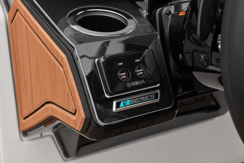 Slide: The Image of Yamaha Boats 2026 252SD dashboard with start/stop buttons and cup holder. - 12