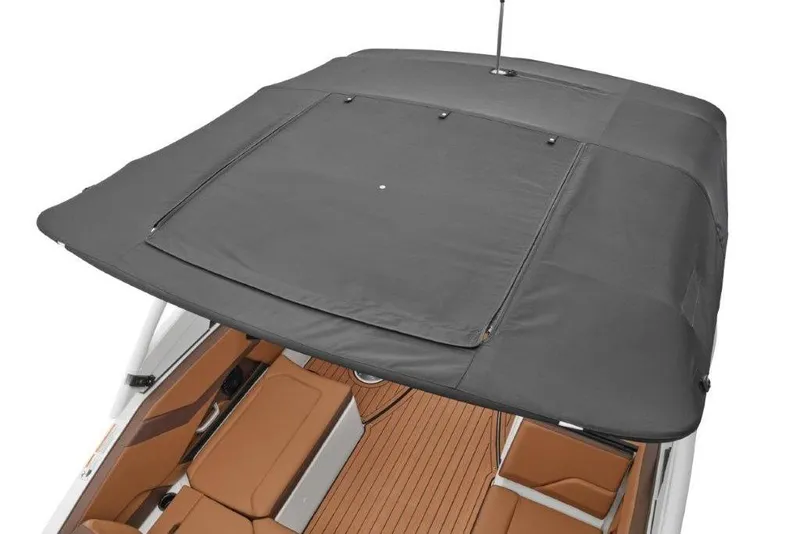 Slide: The Image of 2026 Yamaha Boats 252SD with gray canopy and tan seating, top view. - 14