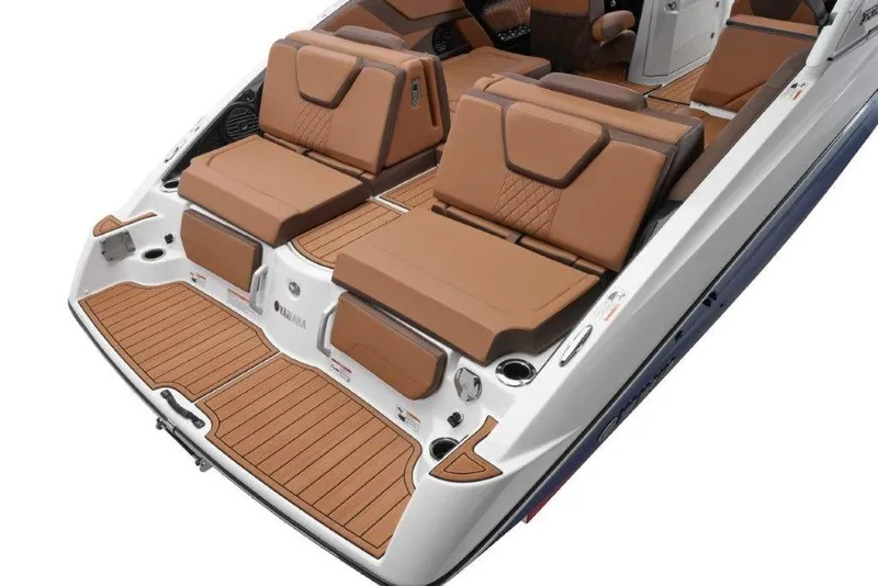 Slide: The Image of 2026 Yamaha Boats 252SD interior with luxurious brown seating and sleek design. - 19