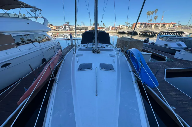 Slide: The Image of Compact bathroom in a 2000 Hunter 460 yacht with toilet, sink, and storage. - 25