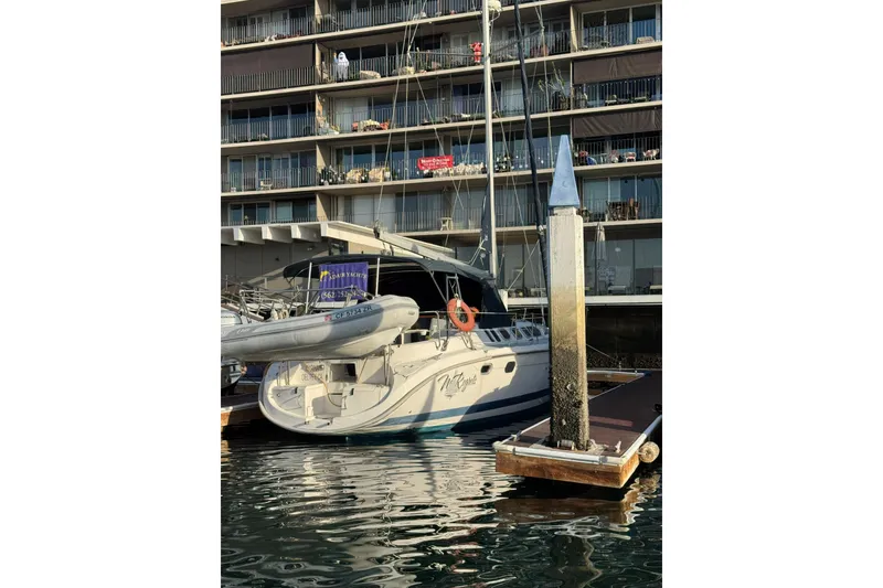 Slide: The Image of Sailboat docked at marina, 2000 Hunter 460 model, sunny day. - 6