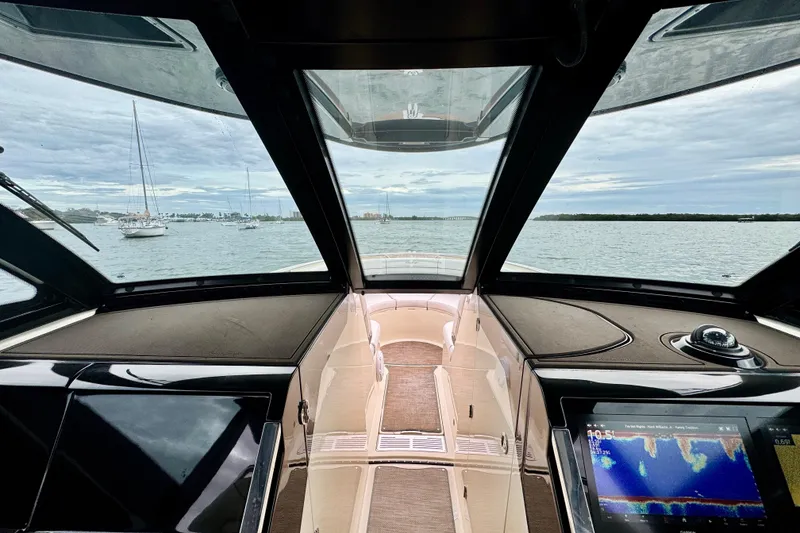 Slide: The Image of Interior view of 2021 Chris-Craft Calypso 35 boat with navigation display. - 32