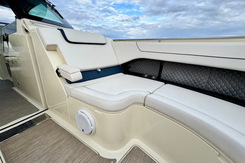 Slide: The Image of Luxurious seating on 2021 Chris-Craft Calypso 35 boat with elegant upholstery. - 36