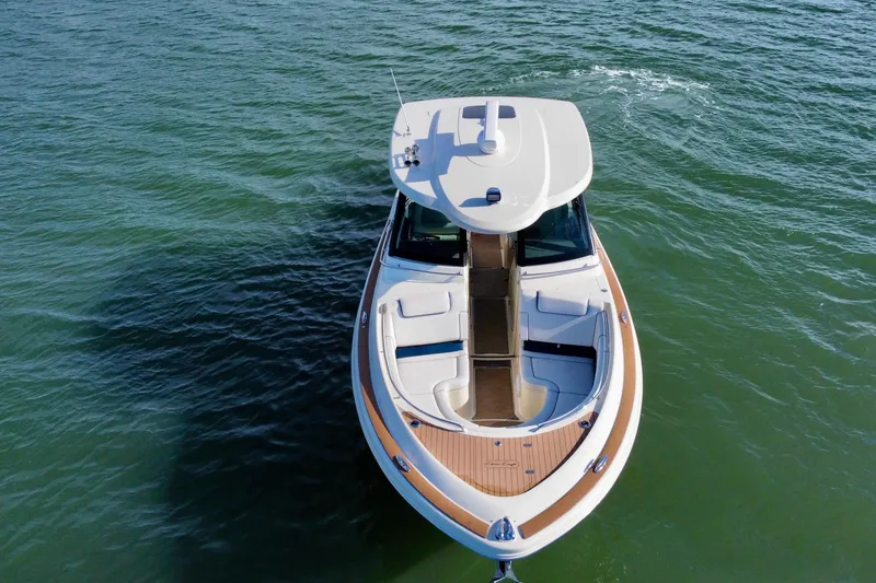 Slide: The Image of 2021 Chris-Craft Calypso 35 boat on calm water, aerial view. - 4