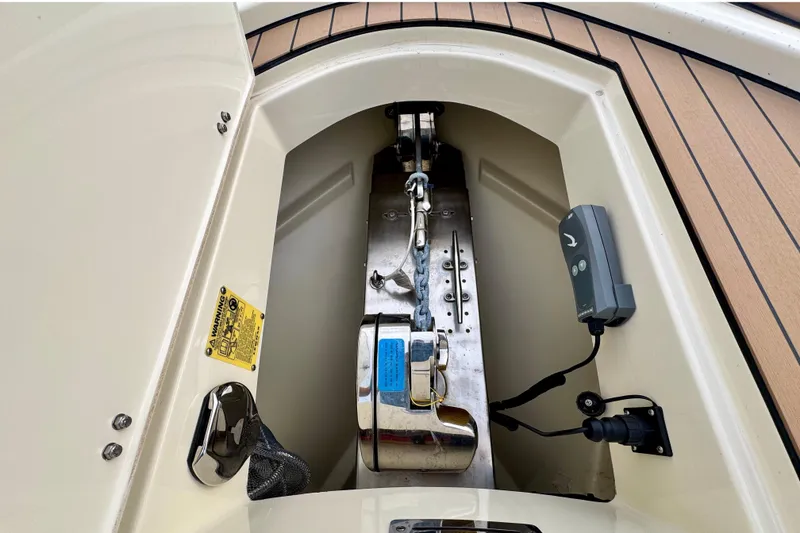 Slide: The Image of Anchor compartment of 2021 Chris-Craft Calypso 35. - 48
