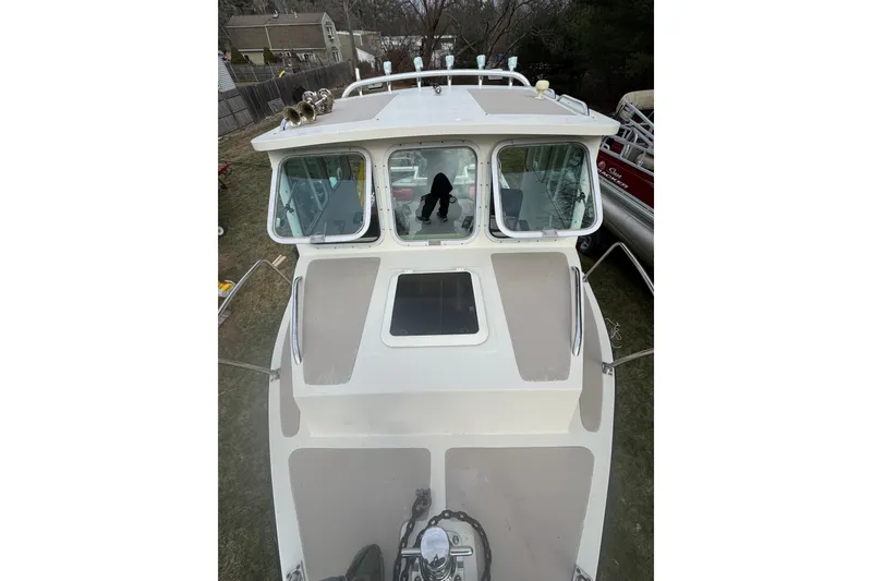Slide: The Image of 2007 Cape Island Pilot boat with spacious deck and cabin windows, viewed from above. - 7