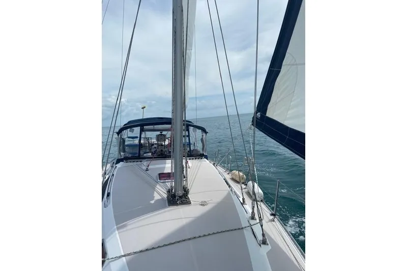 Slide: The Image of Sailing on a 2011 Catalina 355 yacht in open waters under a clear sky. - 22