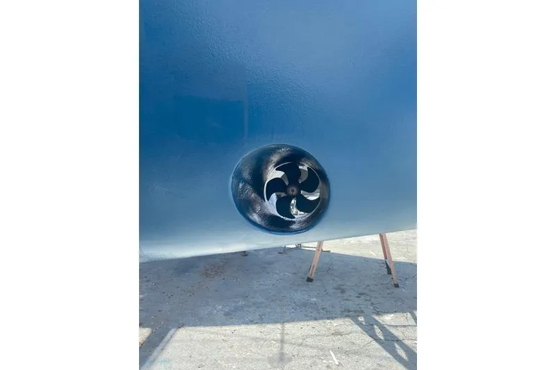 Slide: The Image of Close-up of a 2011 Catalina 355 boat's bow thruster on a blue hull. - 30