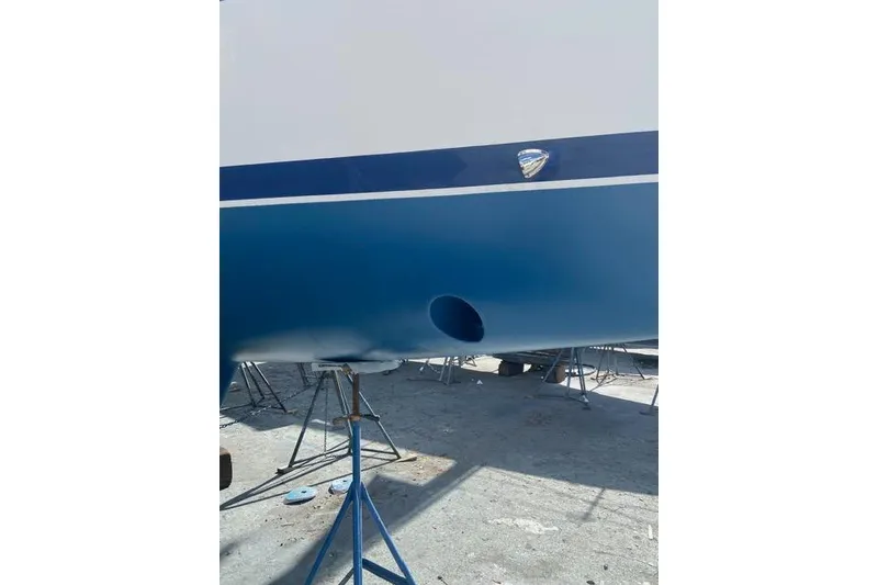 Slide: The Image of Catalina 355 sailboat hull, 2011 model, on stands in a boatyard. - 31
