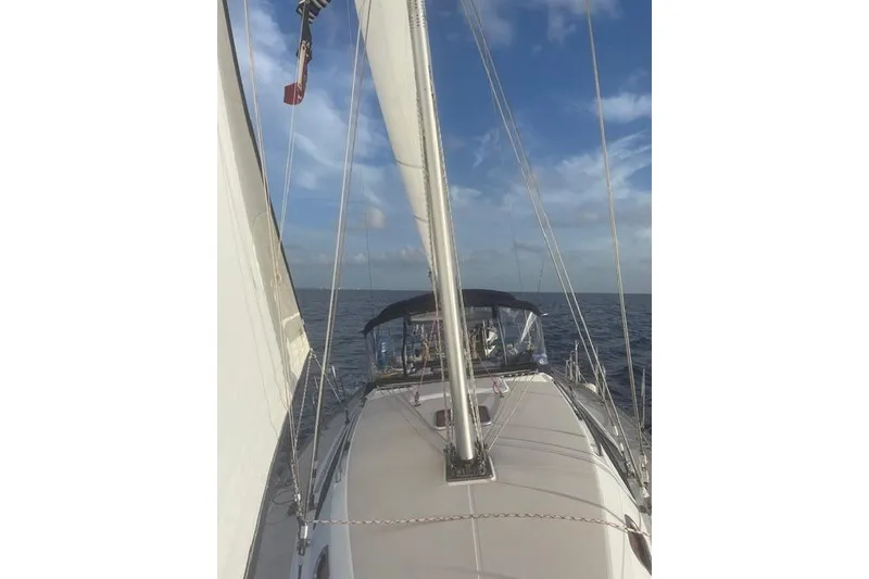 Slide: The Image of Sailing on a 2011 Catalina 355 yacht under clear blue skies. - 33