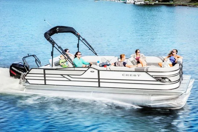 Slide: The Image of Steering wheel and dashboard of 2018 Crest Classic 250 SLS boat with controls and gauges. - 5