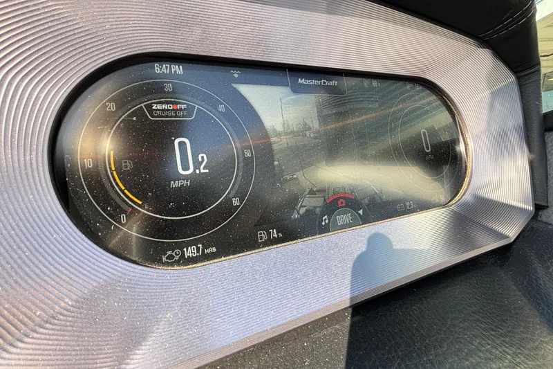 Slide: The Image of 2022 MasterCraft X26 dashboard display showing speed and cruise control settings. - 24