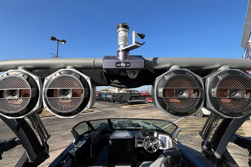 Slide: The Image of 2022 MasterCraft X26 boat with premium audio speakers and sleek dashboard design. - 37