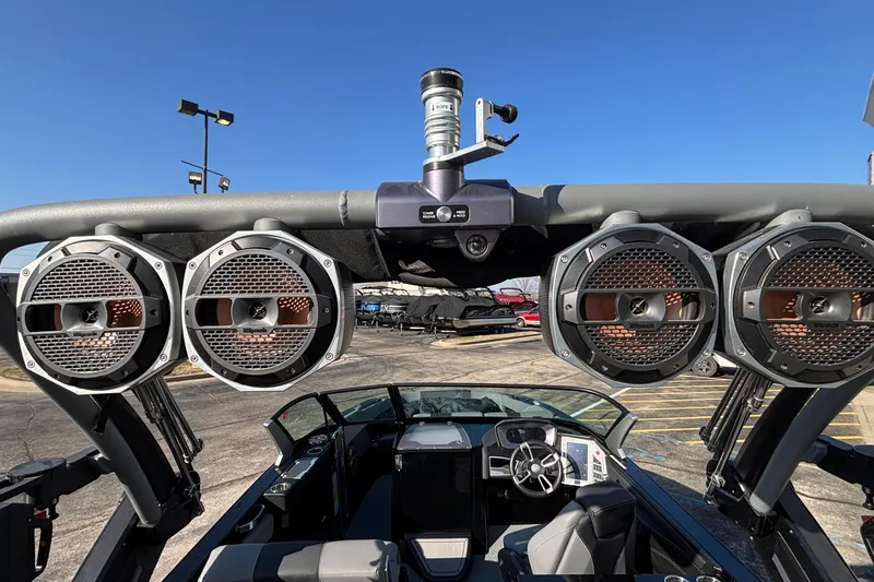 Slide: The Image of 2022 MasterCraft X26 boat with premium audio speakers and sleek interior design. - 38