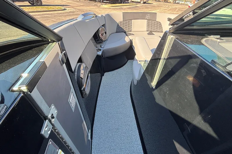 Slide: The Image of 2022 MasterCraft X26 boat interior with sleek seating and modern design. - 56