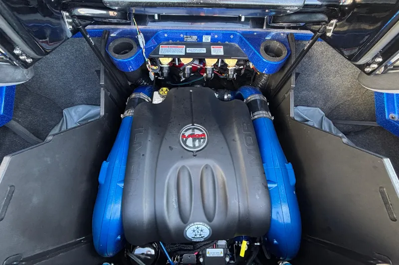 Slide: The Image of Engine compartment of 2022 MasterCraft X26 boat, featuring Ilmor engine components. - 74