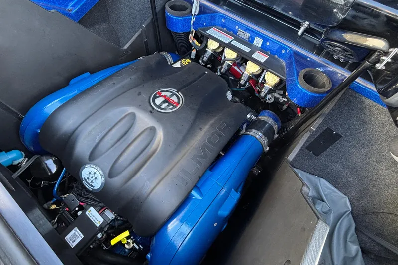 Slide: The Image of 2022 MasterCraft X26 engine compartment with Ilmor engine, showcasing advanced marine technology. - 76