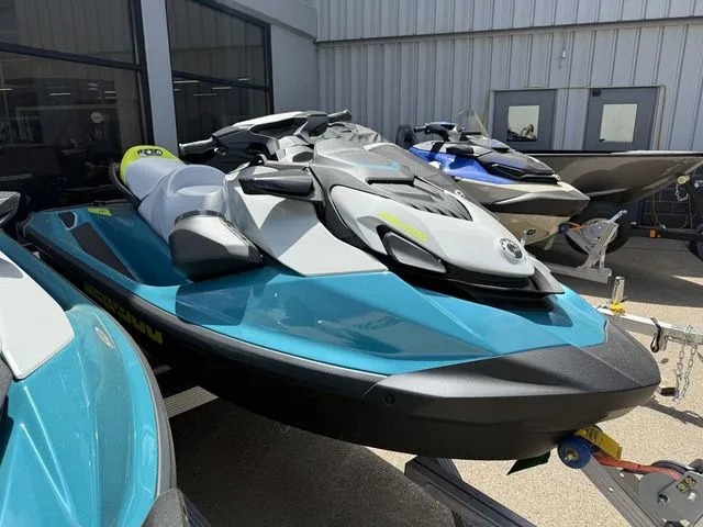 Slide: The Image of 2026 Sea-Doo GTI SE 130 jet ski displayed in showroom. - 3
