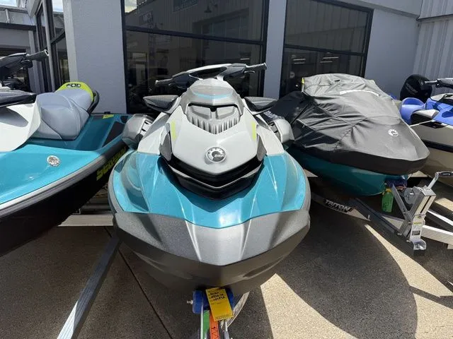 Slide: The Image of 2026 Sea-Doo GTI SE 130 jet ski in blue on a trailer. - 2