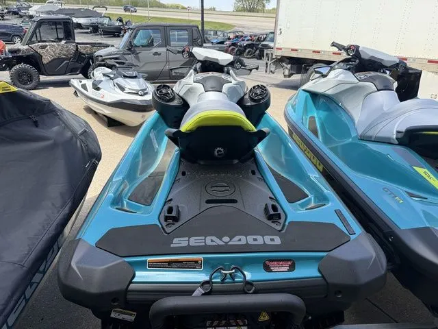 Slide: The Image of 2026 Sea-Doo GTI SE 130 jet ski in a parking lot. - 4