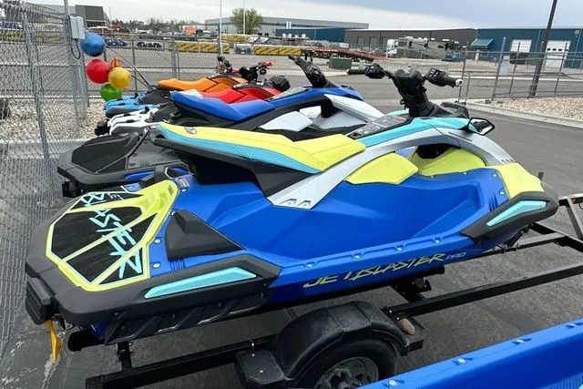 The Image of 2026 Yamaha WaveRunner Jetblaster Pro in blue and yellow on trailer. - 1