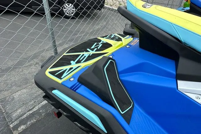 Slide: The Image of 2026 Yamaha WaveRunner JETBLASTER PRO in blue and yellow, close-up view. - 27