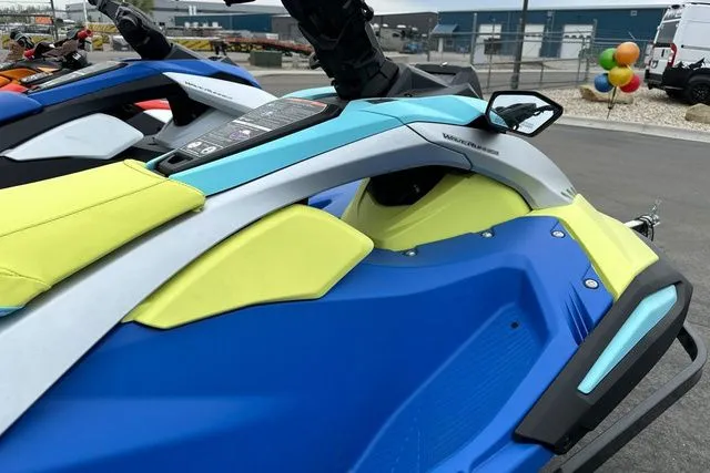 Slide: The Image of 2026 Yamaha WaveRunner JETBLASTER PRO in blue and yellow, close-up view. - 9