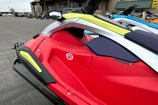 Slide: The Image of Yamaha WaveRunner JETBLASTER PRO 2026 in red and nightshade on parking lot. - 26