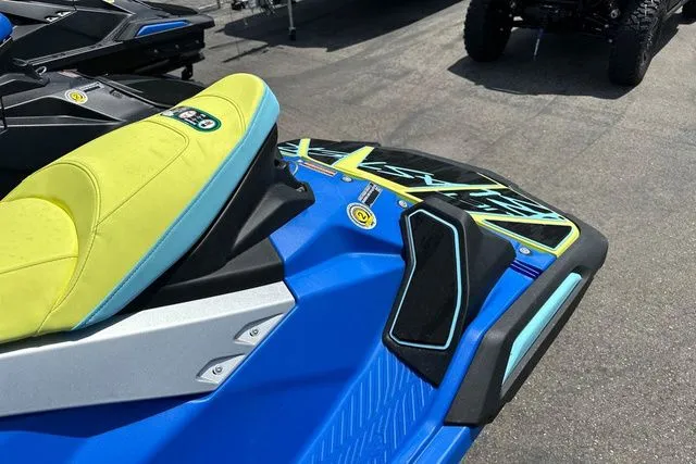 Slide: The Image of 2026 Yamaha WaveRunner JETBLASTER PRO in blue and yellow on asphalt. - 10