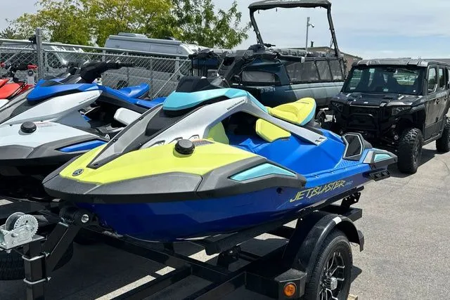 Slide: The Image of 2026 Yamaha WaveRunner JETBLASTER PRO in blue and yellow on trailer. - 19