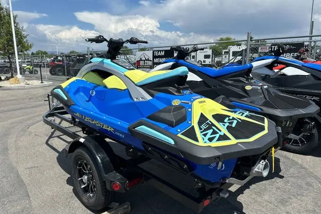 Slide: The Image of 2026 Yamaha WaveRunner JETBLASTER PRO in blue and yellow on trailer. - 5