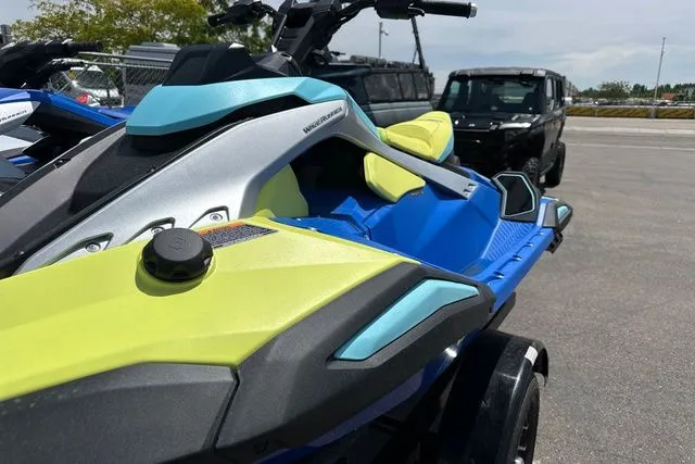 Slide: The Image of 2026 Yamaha WaveRunner JETBLASTER PRO in blue and yellow on parking lot. - 8