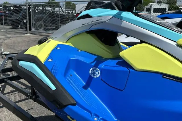 Slide: The Image of 2026 Yamaha WaveRunner Jetblaster in blue and yellow on trailer. - 9