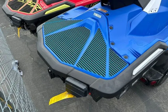 Slide: The Image of Yamaha WaveRunner JETBLASTER DLX 2026 in blue and white on a parking lot. - 12