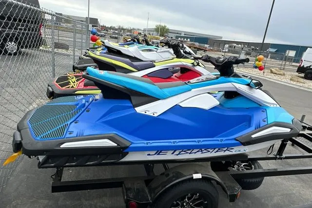 Slide: The Image of 2026 Yamaha WaveRunner Jetblaster DLX in blue and white on trailer. - 18