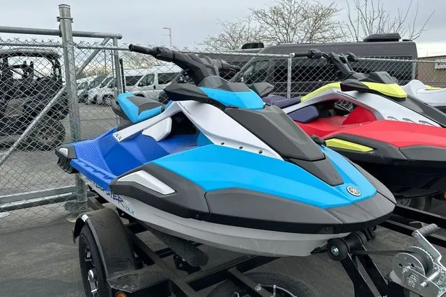 Slide: The Image of 2026 Yamaha WaveRunner Jetblaster in blue and white on trailer. - 19
