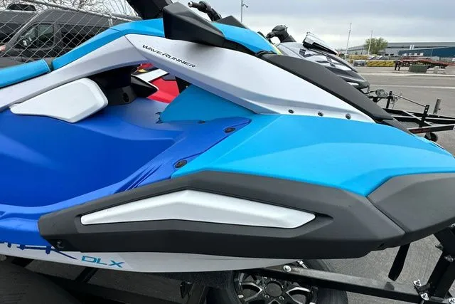 Slide: The Image of 2026 Yamaha WaveRunner JETBLASTER DLX in blue and white on trailer. - 25