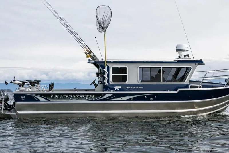 The Image of 2026 Duckworth 28 Offshore boat on water, equipped for fishing. - 1
