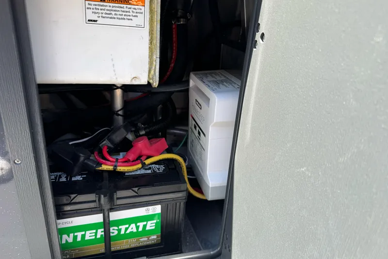 Slide: The Image of Battery compartment of a 2026 Duckworth 28 Offshore boat, featuring Interstate battery. - 22