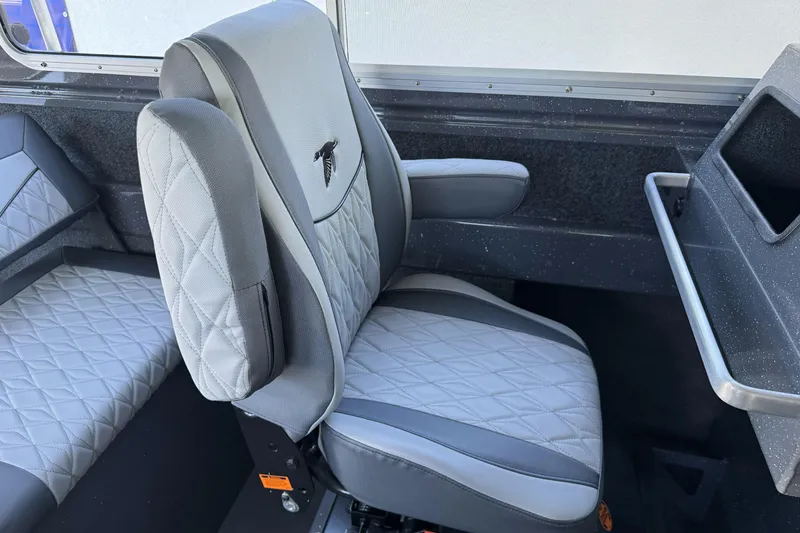 Slide: The Image of Interior of 2026 Duckworth 28 Offshore boat with quilted seating and armrest. - 30