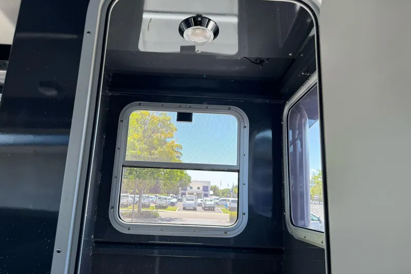 Slide: The Image of Interior view of 2026 Duckworth 28 Offshore boat window and ceiling light. - 37