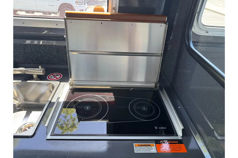 Slide: The Image of Modern kitchen area in 2026 Duckworth 28 Offshore boat with induction cooktop. - 40
