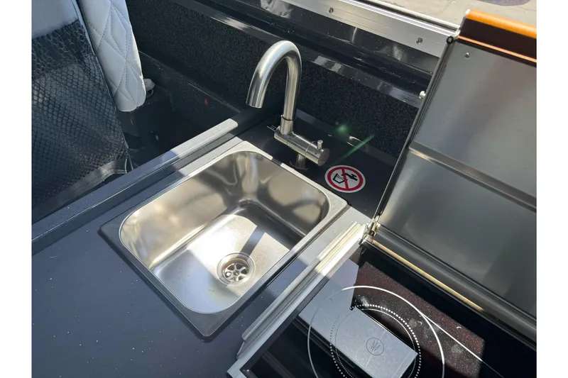 Slide: The Image of Stainless steel sink in 2026 Duckworth 28 Offshore boat interior. - 41