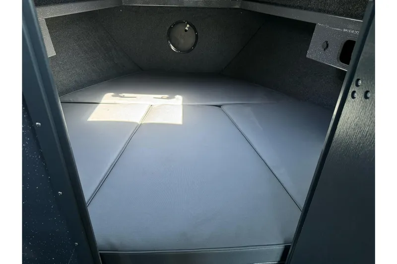 Slide: The Image of Interior cabin of 2026 Duckworth 28 Offshore boat, featuring cushioned sleeping area. - 43