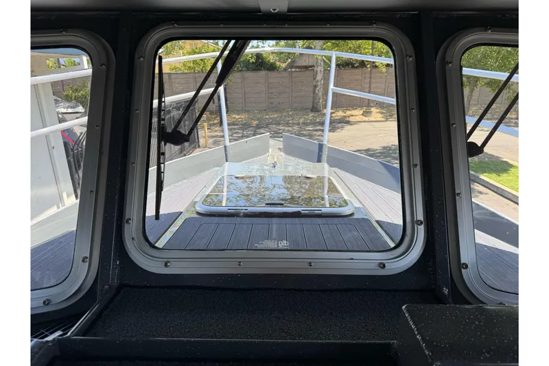 Slide: The Image of Interior view of 2026 Duckworth 28 Offshore boat through front window. - 47