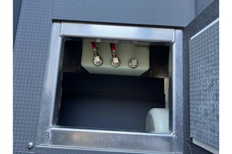 Slide: The Image of Battery compartment of 2026 Duckworth 28 Offshore boat, featuring secure connections. - 48